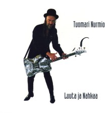 Tuomari Nurmio - Luuta ja nahkaa